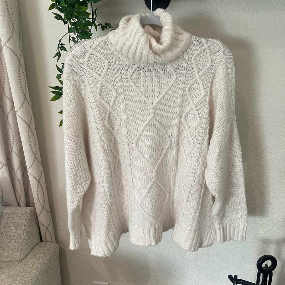 White cable knit sweater
